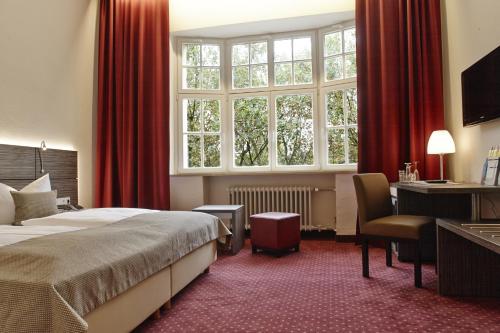 普林斯利津特酒店客房内的一张或多张床位