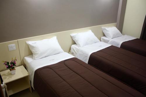 Hotel Portobello客房内的一张或多张床位