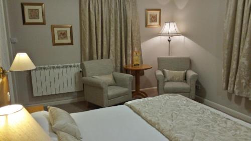 斯塔迪斯城堡酒店客房内的一张或多张床位