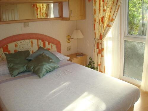 普雷萨比纽埃拉乡村营地酒店客房内的一张或多张床位
