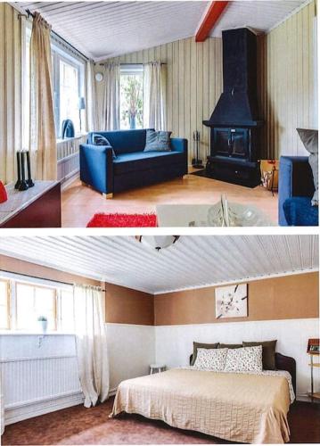 厄勒布鲁Eden (Natur & lugnet)的客厅设有蓝色的沙发和壁炉