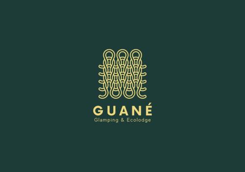 瓜尔内Guané Glamping & Ecolodge - Oriente Antioquia的游戏和技术公司的绿色和黄色标志
