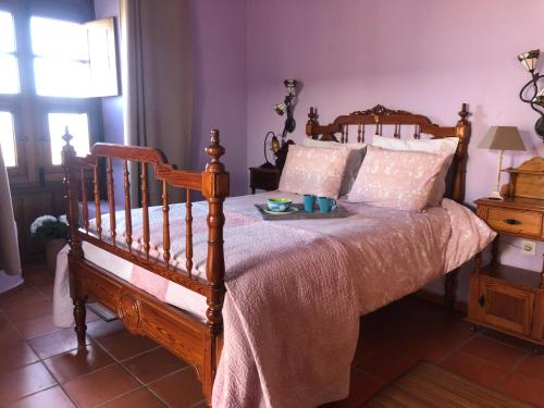 Casona La Orilla 1908 Tías客房内的一张或多张床位