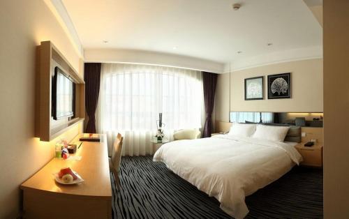 深圳蛇口鸿隆公寓(蛇口海上世界)客房内的一张或多张床位