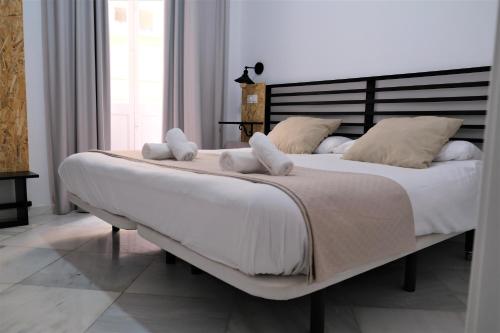 Planeta Cadiz Hostel客房内的一张或多张床位