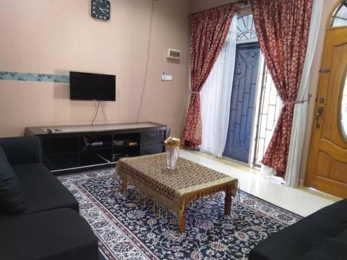 Nafili homestay 3bd 2br的休息区