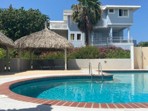 Villa at secured gated resort near Mambo Beach!