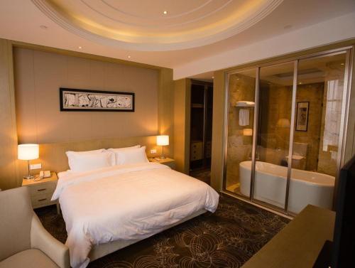 锦江都城上海市北酒店客房内的一张或多张床位
