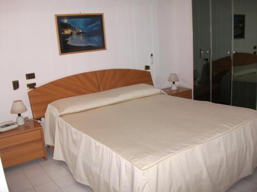 拜亚德阿马尔菲假期酒店客房内的一张或多张床位