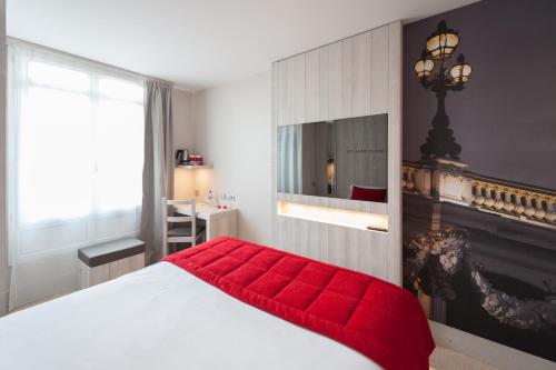 Hôtel le 209 Paris Bercy客房内的一张或多张床位