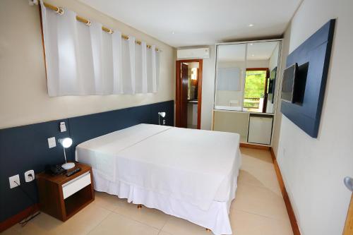 Flamingo Beach - Rede Soberano客房内的一张或多张床位