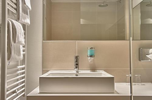 孔蒂杜伊斯堡酒店-索拉酒店的合作伙伴的一间浴室