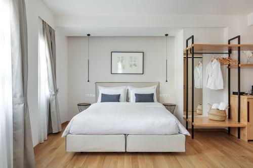 Petrou Suites客房内的一张或多张床位