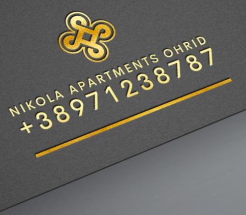奥赫里德Apartment NIKOLA ORANGE的一张有金十字的垄断卡片