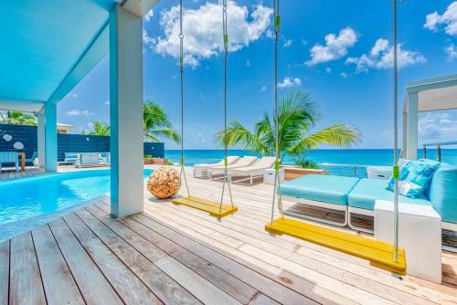 马霍礁Surfsong Villa- Luxury Water Front Villa for 12的海景别墅