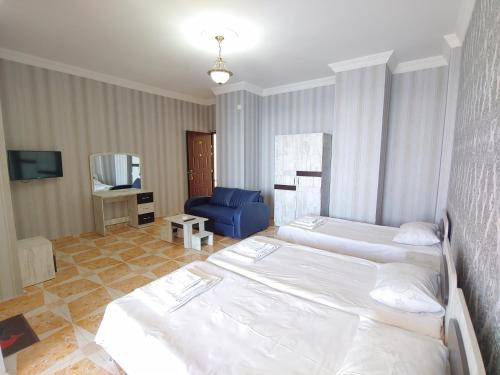 Hotel Kvariati Nugo客房内的一张或多张床位