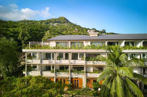 马埃岛laïla, Seychelles, a Marriott Tribute Portfolio Resort的山地建筑的背景图象