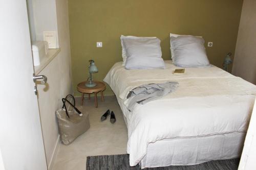 Hôtel particulier de Monméja客房内的一张或多张床位