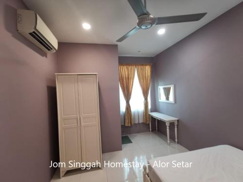 Jom Singgah Homestay - Alor Setar的电视和/或娱乐中心
