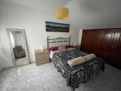 Loft céntrico en Ribadavia客房内的一张或多张床位