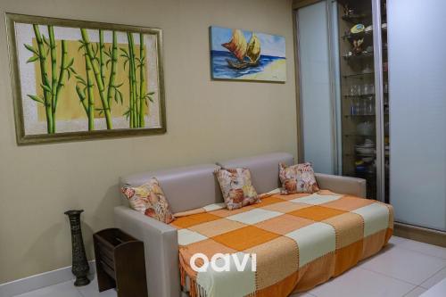 帕纳米林Qavi - Flat em Resort Beira Mar Cotovelo #InMare57的卧室配有一张床