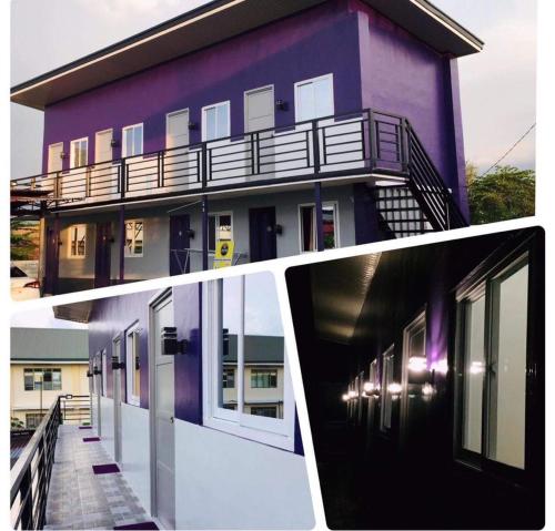 UrdanetaJC Unit #8的紫色的建筑,在建筑的一侧设有阳台