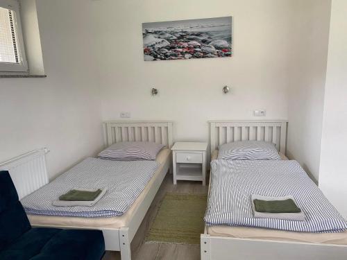 Strečno普里瓦西姆巴乡村民宿的双床间设有2张单人床。
