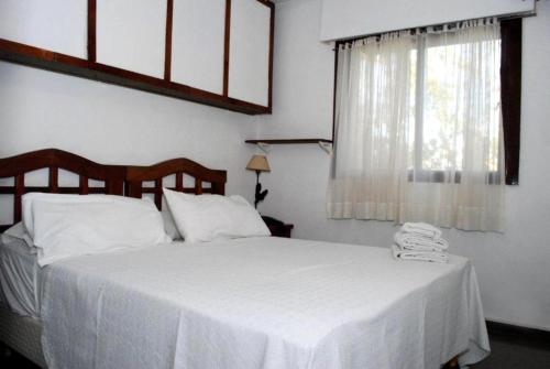 Laerte Hotel Mendoza客房内的一张或多张床位