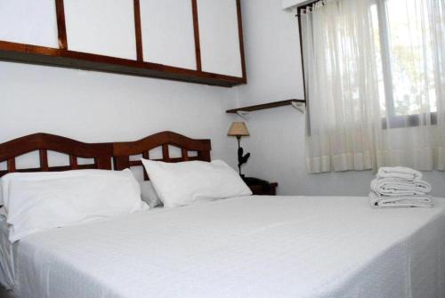 Laerte Hotel Mendoza客房内的一张或多张床位