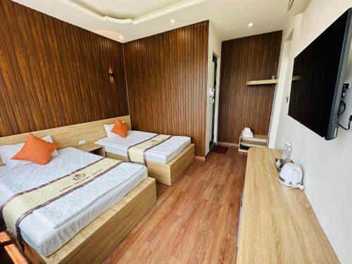 Minh Hoang Hotel & Homestay客房内的一张或多张床位