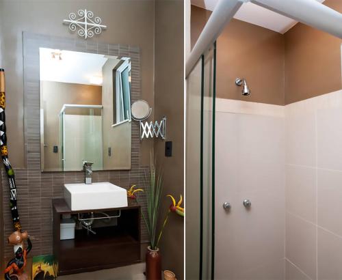 里约热内卢Leblon Dream Apartment的一间带水槽和镜子的浴室