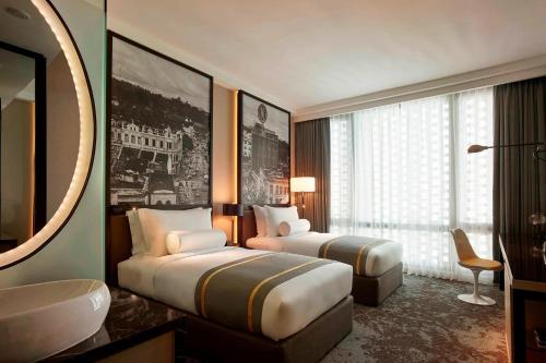 吉隆坡吉隆坡·觅酒店，傲途格精选的酒店客房带两张床和一间浴室