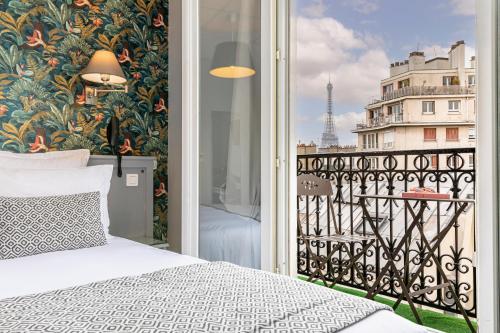 巴黎辉煌酒店的市景卧室 - 带1张床