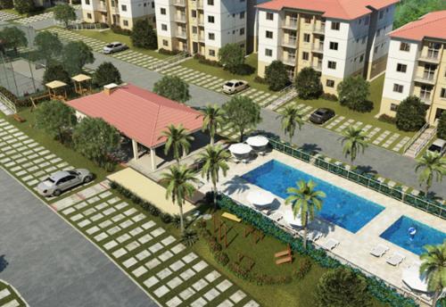 马瑙斯Apartamento Ideal Flores的享有带游泳池的度假村的空中景致