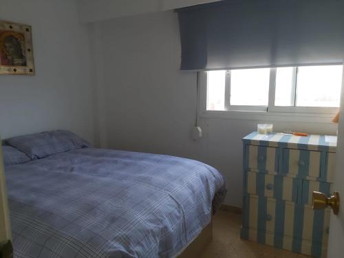 Apartamento con vistas al mar客房内的一张或多张床位
