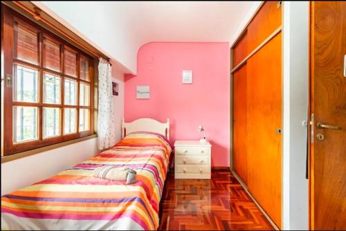 Experiencia Olivos客房内的一张或多张床位