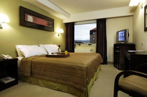 乌斯怀亚MIL810酒店客房内的一张或多张床位