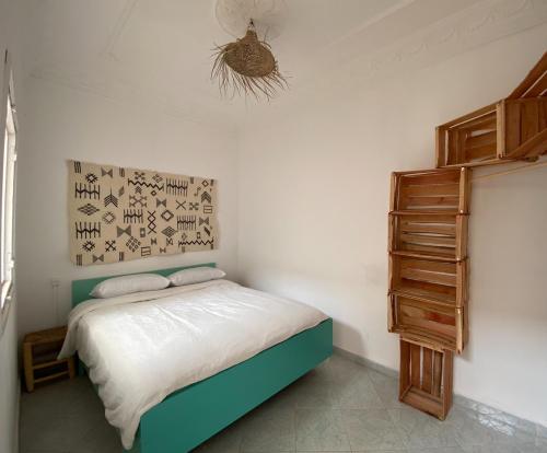 Kasbari House客房内的一张或多张床位