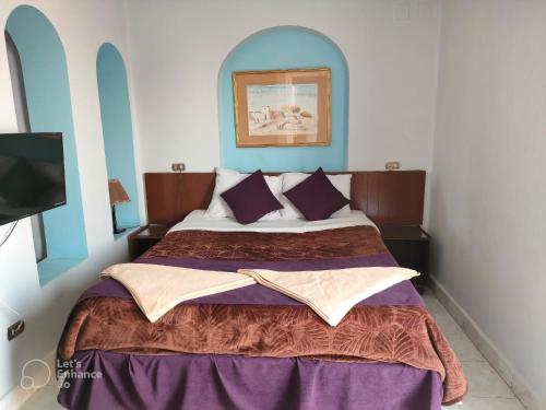 Halomy Sharm Resort客房内的一张或多张床位