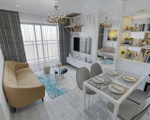 河内Lu Luxury Homestay et Apartment - Vinhomes Smart City Hanoi的客厅配有桌椅和电视。
