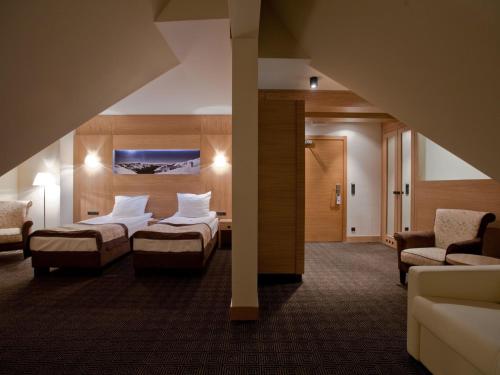 诺萨洛维庭院大酒店客房内的一张或多张床位