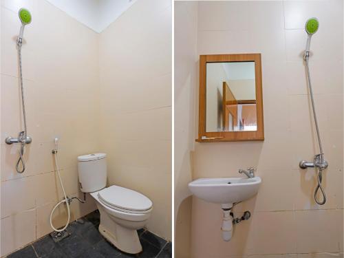 名古屋SPOT ON 92569 Anto Homestay Syariah的一间带卫生间、水槽和镜子的浴室