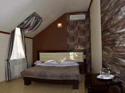 Rostov Hotel客房内的一张或多张床位