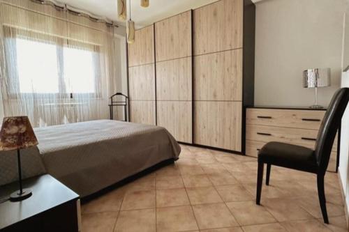 Appartamento Oasi di Pontenuovo客房内的一张或多张床位