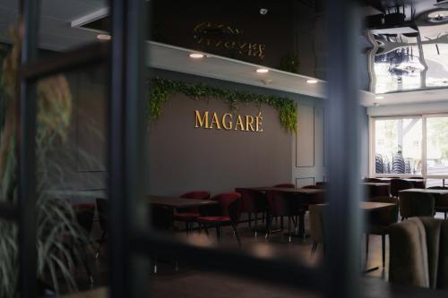 Magaré Hotel & Restaurant餐厅或其他用餐的地方
