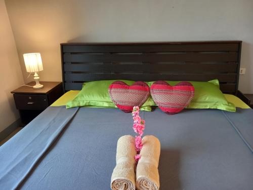 桑迪普兰广场公寓式酒店客房内的一张或多张床位