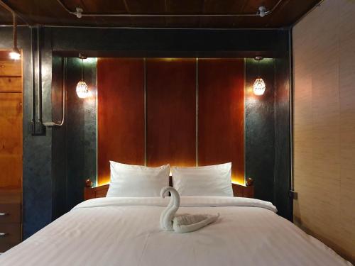 Vintage54 Hotel Ayutthaya客房内的一张或多张床位