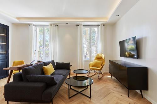 Appartement exceptionnel avec parking Centre-ville Aix-en-Provence的休息区