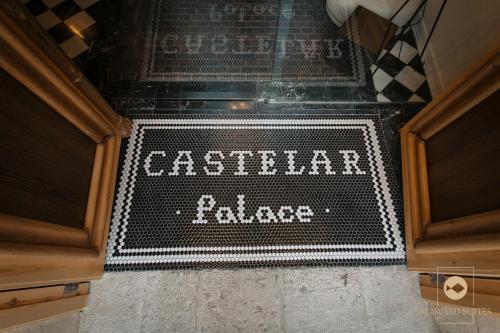 比利亚霍约萨Castelar Palace & SPA by Seaward Suites的瓷砖地板上写着自助餐厅宫殿的标志