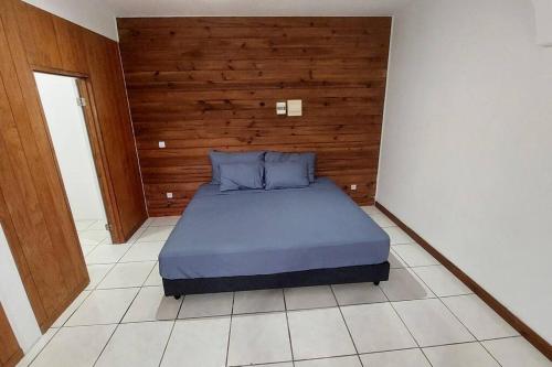 Moorea Maharepa Appartement客房内的一张或多张床位